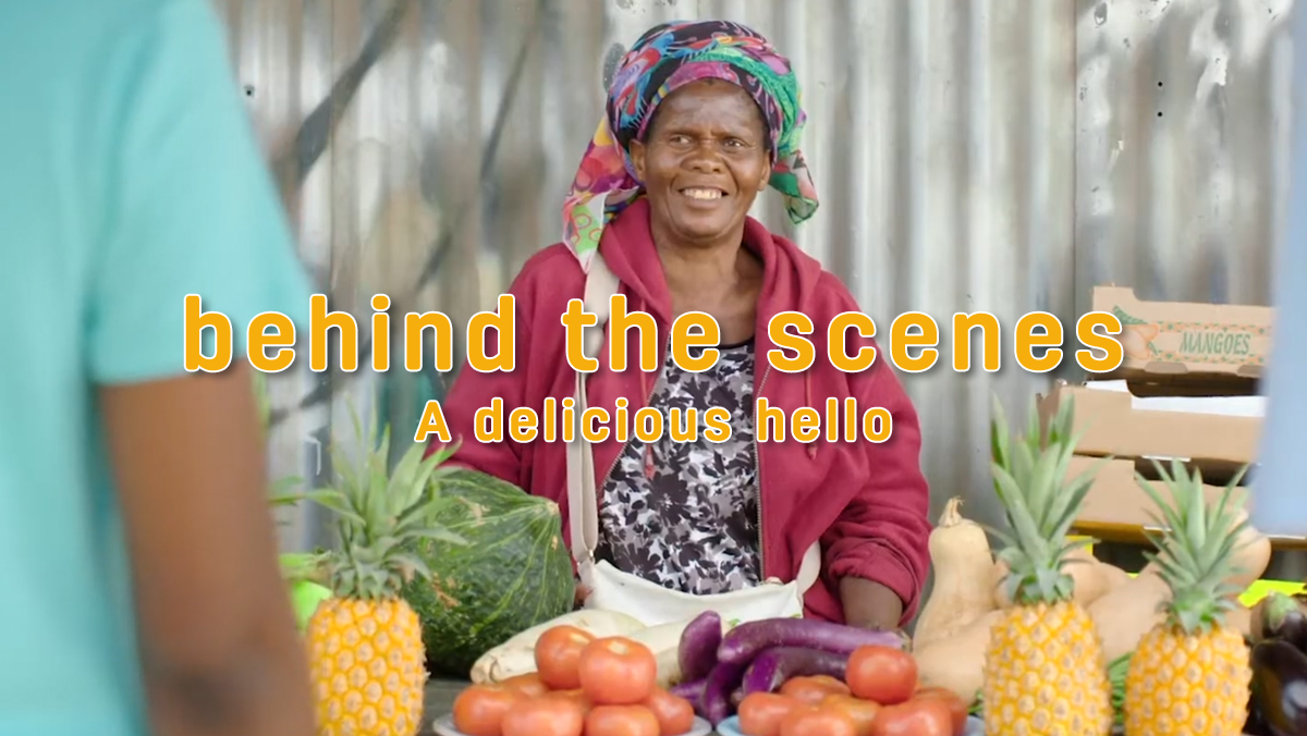 Hollard a delicious hello - video thumbnail of an older african lady selling fruit and vegetables.